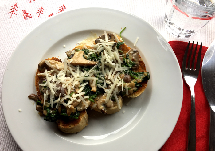 Mushrooms with baby-spinach on toast