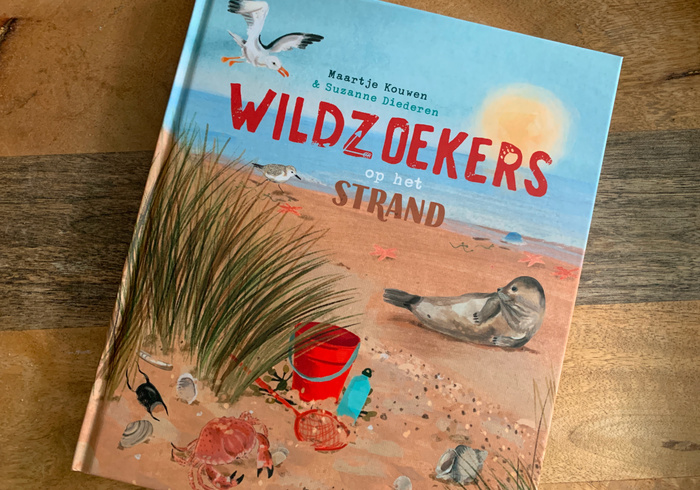 Wildzoekers op het strand homepage