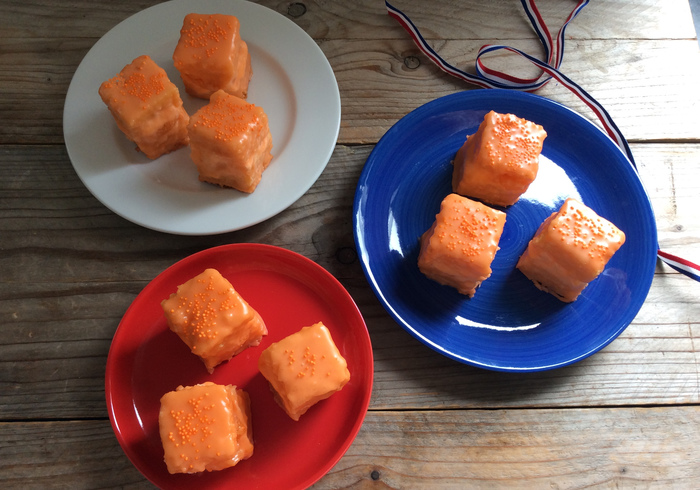 Orange fondant fancies